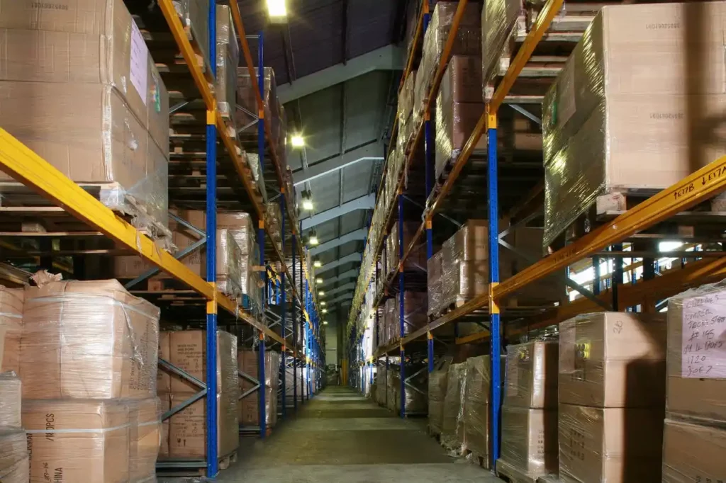 The High Costs of Overlooking Restacking in Cross Docking
